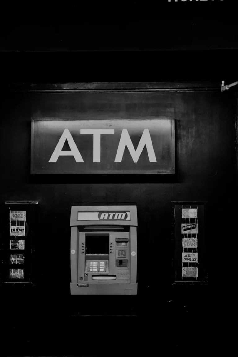 Ce inseamna codul SWIFT grayscale photo of ATM machine